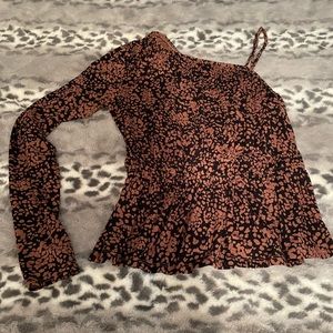 Xsmall, brown and black, too from The Buckle. The brand is Willow and Root